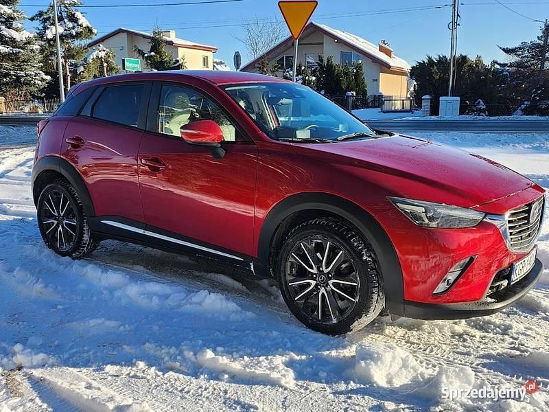 Używany Mazda CX-3 105 KM (77 kW) 2015 Bordowy SUV