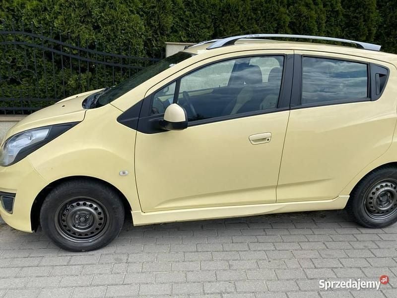 Żółty Używany 2013 Chevrolet Spark Hatchback | 11 500 zł (Uczciwa cena) - Obraz 1/4