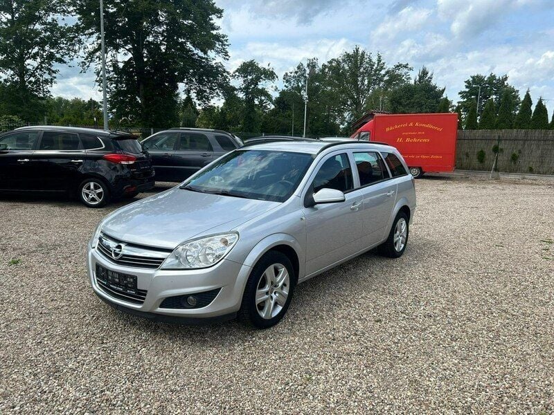 Srebrny Używany 2009 Opel Astra Kombi | 11 500 zł (Uczciwa cena) - Obraz 1/4