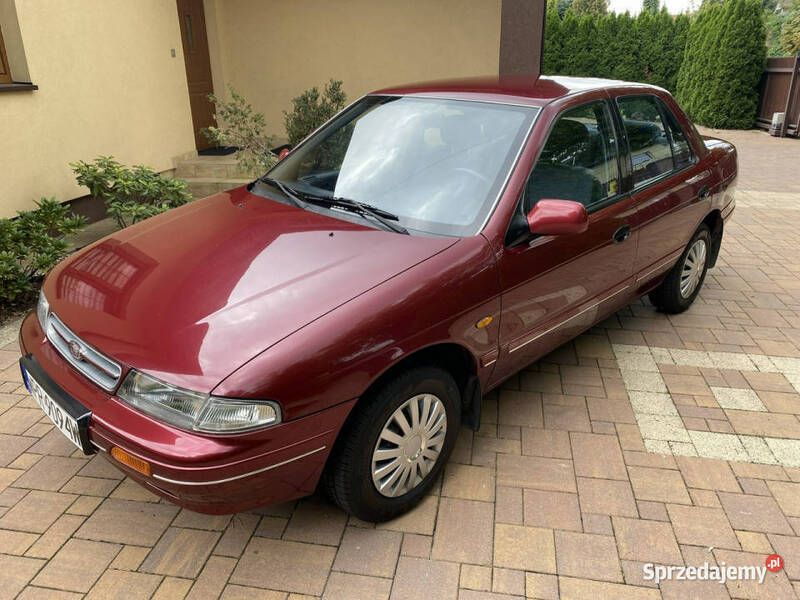 Bordowy Używany 1994 Kia Sephia 2 Sedan/Limuzyna | 19 900 zł - Obraz 1/4