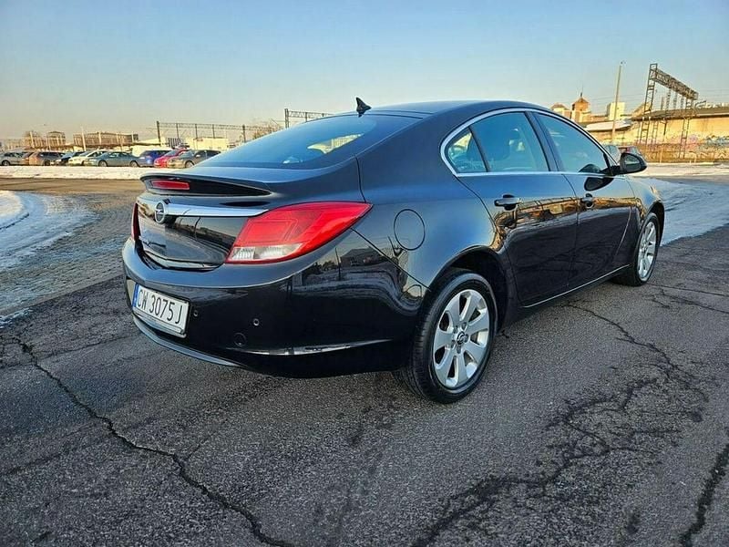 Używany Opel Insignia 115 KM (84 kW) 2010 Czarny Sedan/Limuzyna