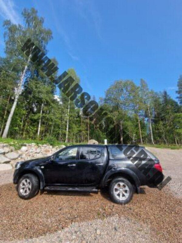 Używany Mitsubishi L200 178 KM (130 kW) 2011 Czarny Pickup