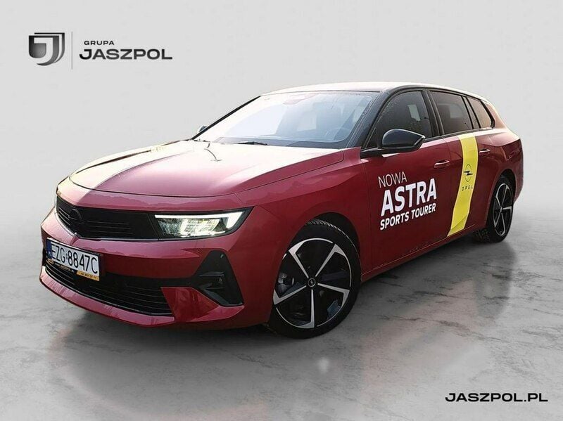 Czerwony (metalik) Używany 2024 Opel Astra Kombi | 119 900 zł - Obraz 1/4