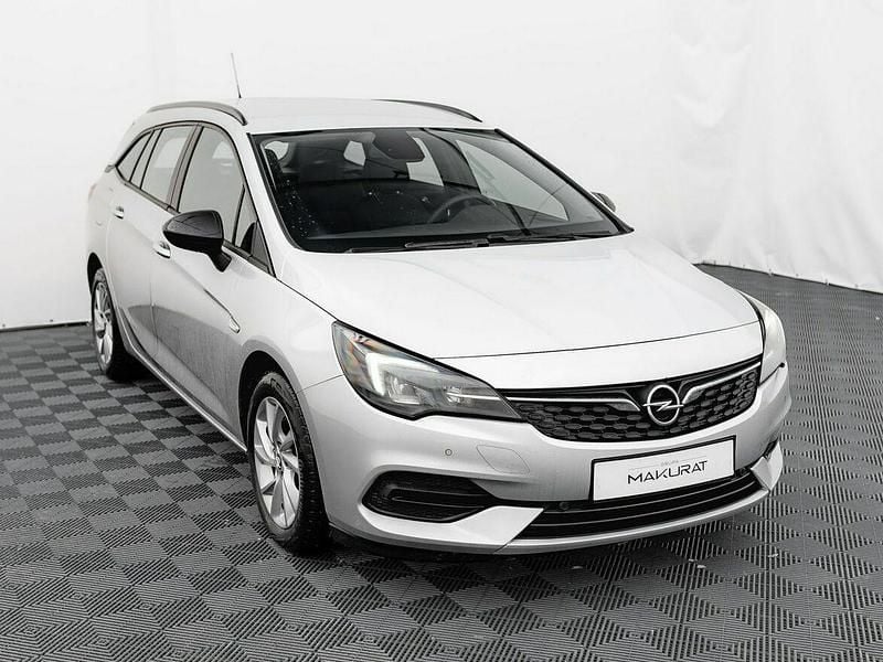 Używany Opel Astra Edition 130 KM (95 kW) 2021 Srebrny (metalik) Kombi