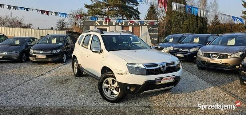 Biały Używany 2013 Dacia Duster SUV | 18 800 zł (Uczciwa cena) - Obraz 1/2