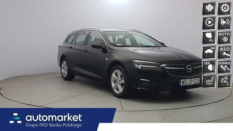 Czarny Używany 2021 Opel Insignia Elegance Kombi | 74 800 zł (Uczciwa cena) - Obraz 1/4