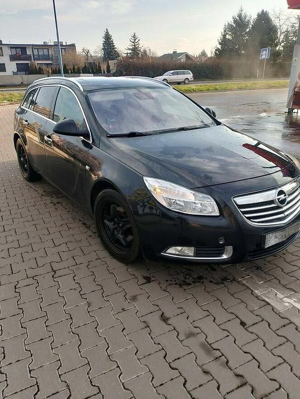 Czarny Używany 2010 Opel Insignia Kombi | 10 900 zł (Uczciwa cena) - Obraz 1/4