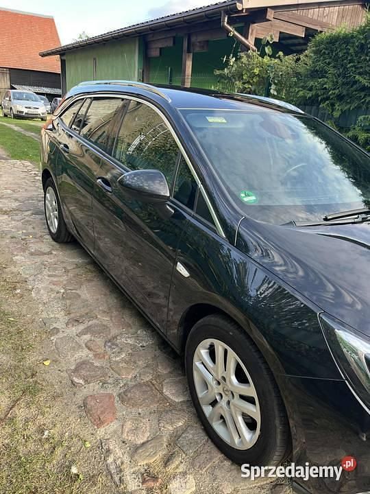 Czarny Używany 2016 Opel Astra Kombi | 27 550 zł (Uczciwa cena) - Obraz 1/4