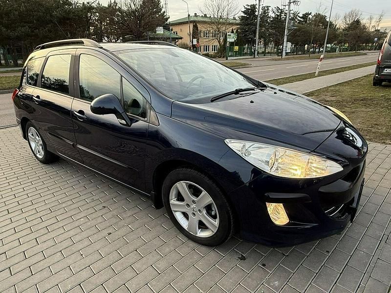 Używany Peugeot 308 112 KM (82 kW) 2011 Niebieski ciemny (metalik) Kombi
