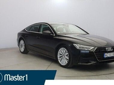 Czarny Używany 2018 Audi A7 Ambiente Hatchback | 199 850 zł (Uczciwa cena) - Obraz 1/4