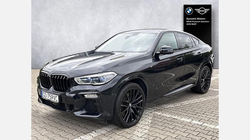 Czarny carbon metalizowany Używany 2020 BMW X6 M50 Shadowline SUV | 289 000 zł - Obraz 1/4