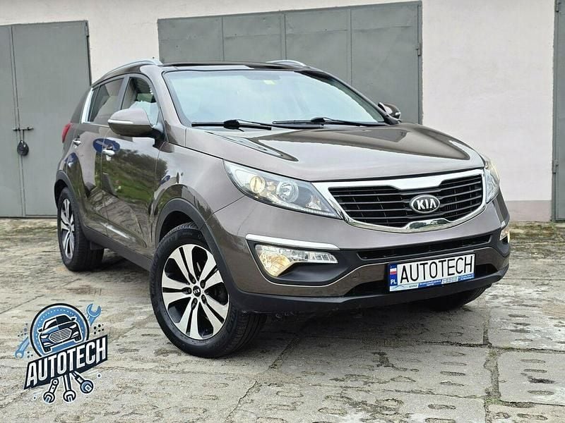 Brązowy Używany 2013 Kia Sportage SUV | 39 999 zł (Uczciwa cena) - Obraz 1/4