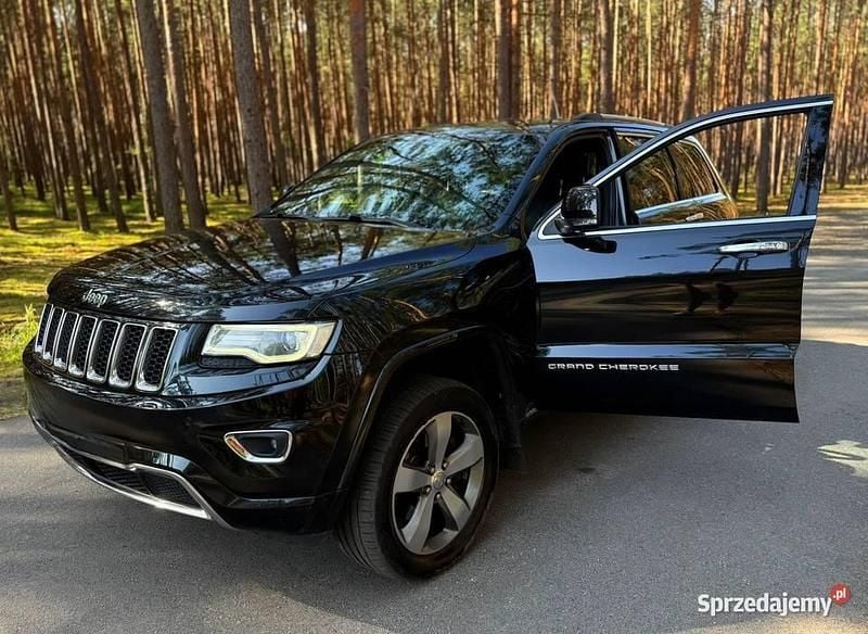 Czarny Używany 2013 Jeep Grand Cherokee Overland SUV | 53 999 zł (Uczciwa cena) - Obraz 1/4
