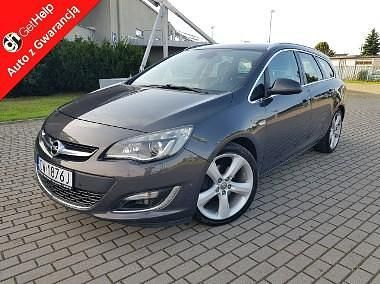 Szary Używany 2014 Opel Astra Kombi | 31 900 zł (Uczciwa cena) - Obraz 1/4