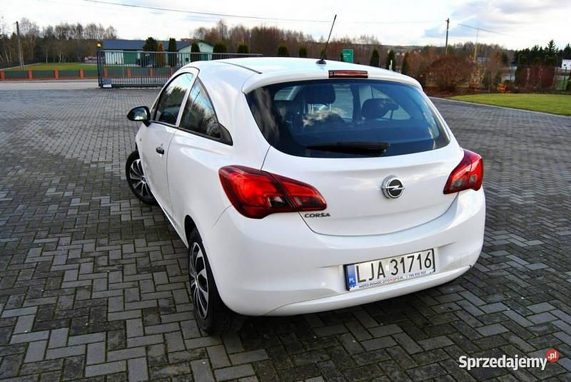 Używany Opel Corsa 70 KM (51 kW) 2014 Czerwony (metalik) Coupe