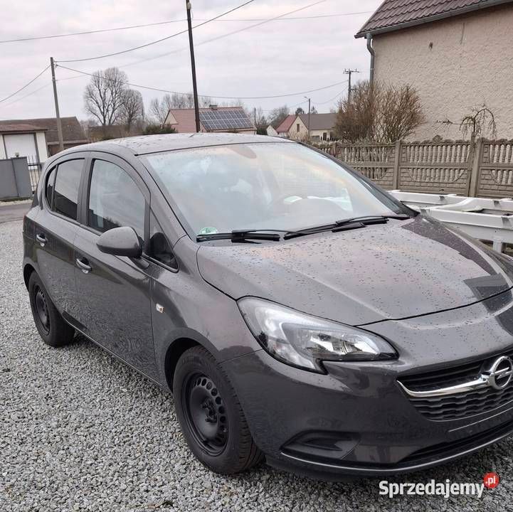 Brązowy Używany 2015 Opel Corsa Hatchback | 28 000 zł (Uczciwa cena) - Obraz 1/4