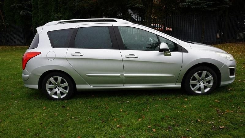 Używany Peugeot 308 SW 112 KM (82 kW) 2012 Srebrny (metalik) Kombi