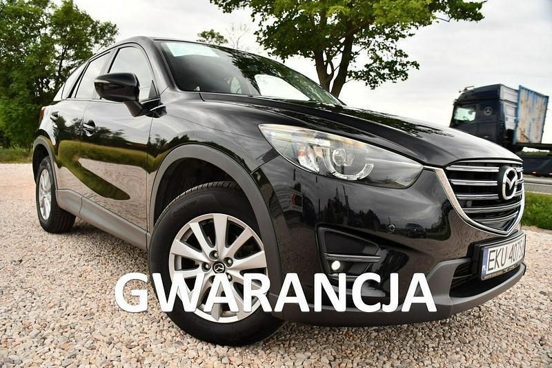 Czarny (metalik, perła) Używany 2016 Mazda CX-5 SUV | 49 999 zł (Uczciwa cena) - Obraz 1/4