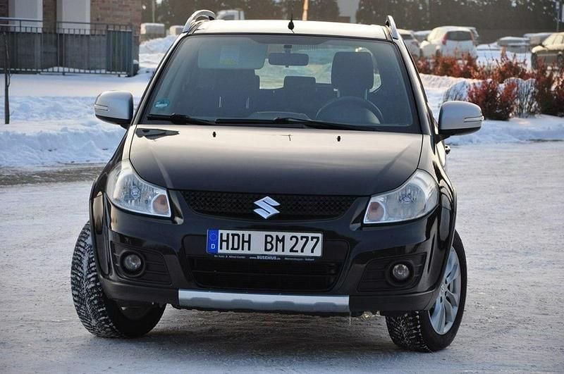 Używany Suzuki SX4 120 KM (88 kW) 2014 Czarny (metalik) Sedan/Limuzyna