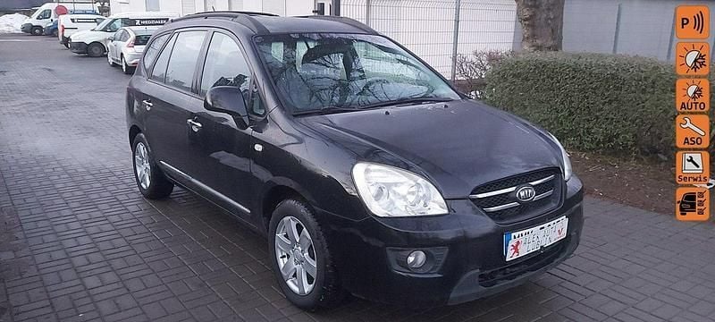 Czarny (metalik, perła) Używany 2009 Kia Carens 2 Minivan | 13 700 zł (Dobra cena) - Obraz 1/4