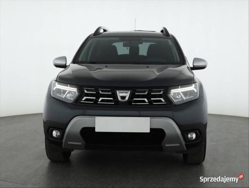 Szary Używany 2022 Dacia Duster SUV | 74 499 zł (Uczciwa cena) - Obraz 1/4