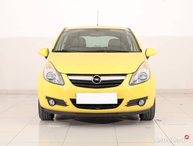 Żółty Używany 2009 Opel Corsa Hatchback | 9999 zł (Uczciwa cena) - Obraz 1/4
