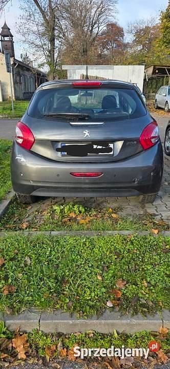 Brązowy Używany 2014 Peugeot 208 Hatchback | 9600 zł (Super Cena) - Obraz 1/4