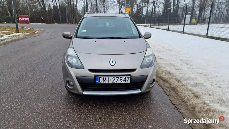 Używany Renault Clio II 86 KM (63 kW) 2009 Beżowy Kombi