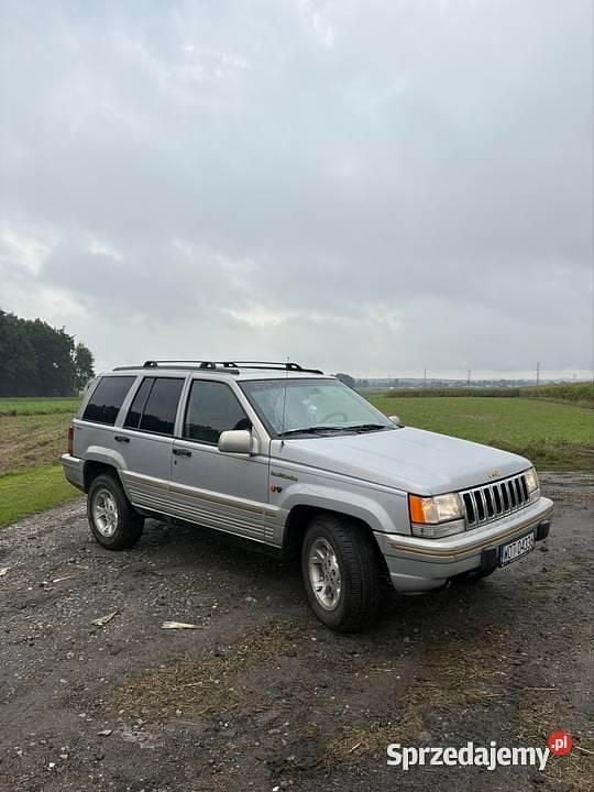 Srebrny Używany 1998 Jeep Grand Cherokee SUV | 25 000 zł - Obraz 1/4