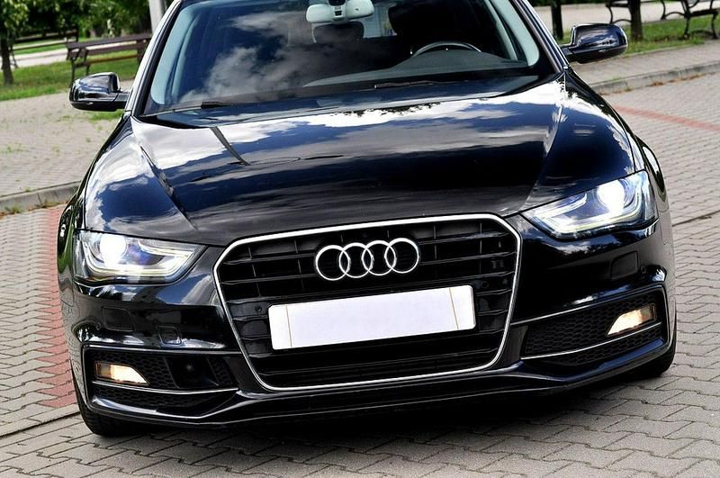 Czarny (metalik, perła) Używany 2014 Audi A4 Kombi | 39 900 zł (Dobra cena) - Obraz 1/4