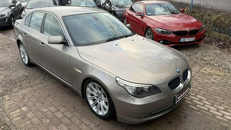 Używany BMW 520 177 KM (130 kW) 2007 Brązowobeżowy Sedan/Limuzyna