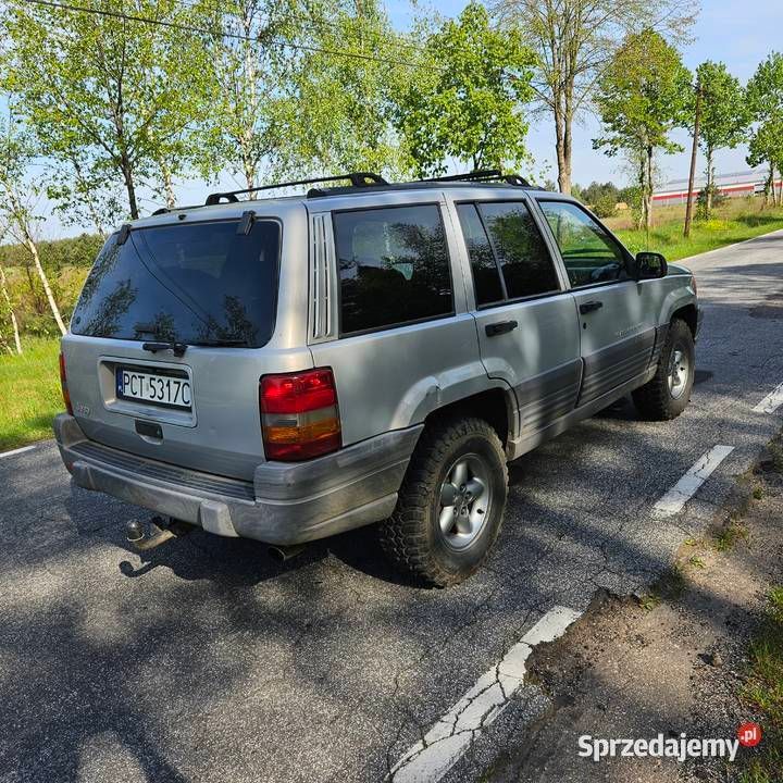 Srebrny Używany 1997 Jeep Grand Cherokee SUV | 18 400 zł - Obraz 1/4