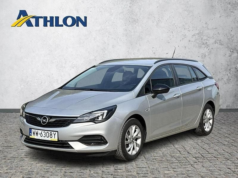 Srebrny (metalik) Używany 2022 Opel Astra Kombi | 70 500 zł (Dość drogi) - Obraz 1/4
