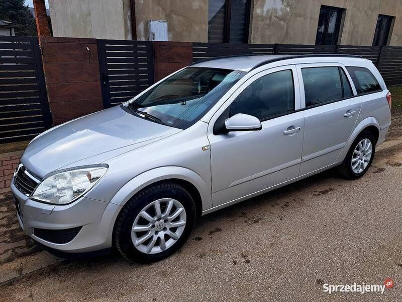 Srebrny Używany 2009 Opel Astra Kombi | 9900 zł (Uczciwa cena) - Obraz 1/4