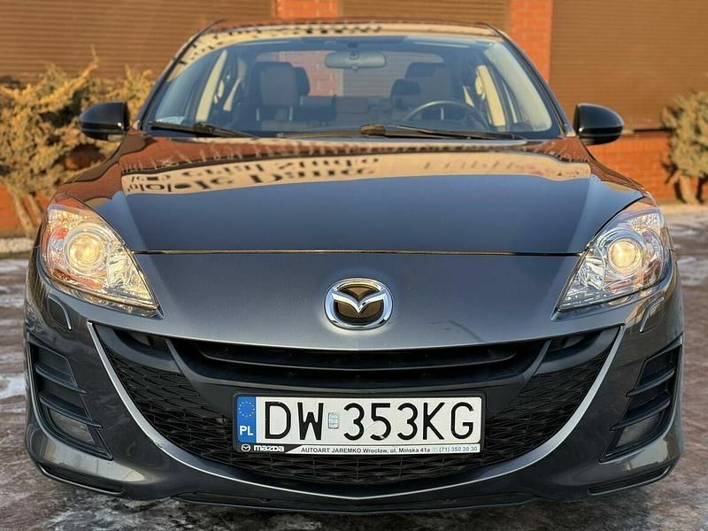 Używany Mazda 3 Comfort 105 KM (77 kW) 2009 Szary Sedan/Limuzyna