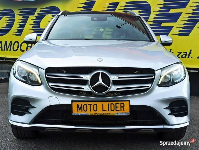 Szary (metalik) Używany 2016 Mercedes GLC250 AMG SUV | 89 900 zł - Obraz 1/4