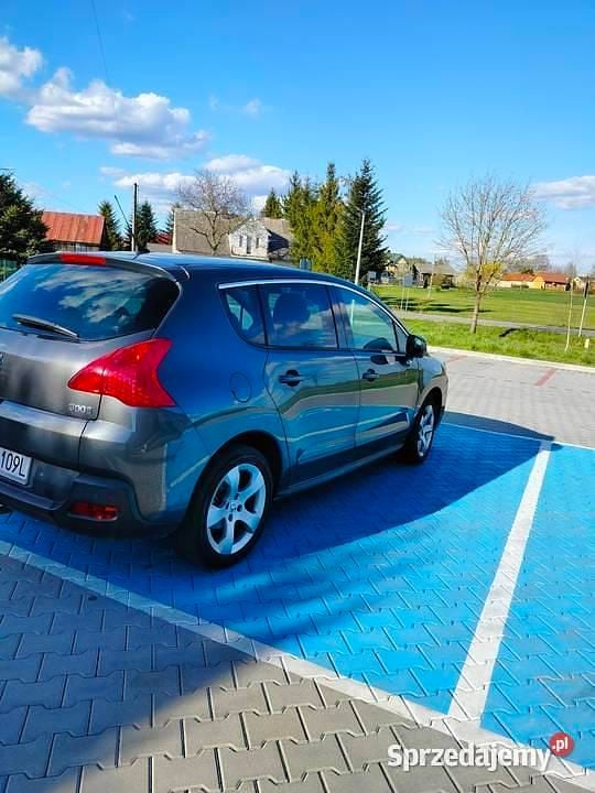 Grafitowy Używany 2013 Peugeot 3008 Minivan | 25 000 zł (Dobra cena) - Obraz 1/4