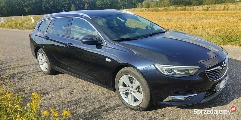Granatowy Używany 2018 Opel Insignia Executive Kombi | 49 999 zł (Uczciwa cena) - Obraz 1/4