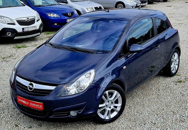 Grafitowy (metalik) Używany 2009 Opel Corsa Hatchback | 18 800 zł (Uczciwa cena) - Obraz 1/4