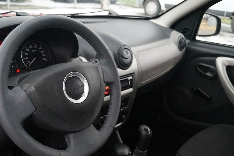 Używany Dacia Sandero 75 KM (55 kW) 2012 Czarny (metalik) Hatchback