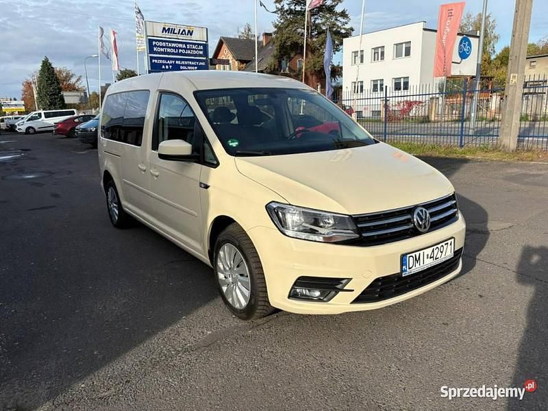 Używany VW Caddy 105 KM (77 kW) 2019 Kremowy Minivan