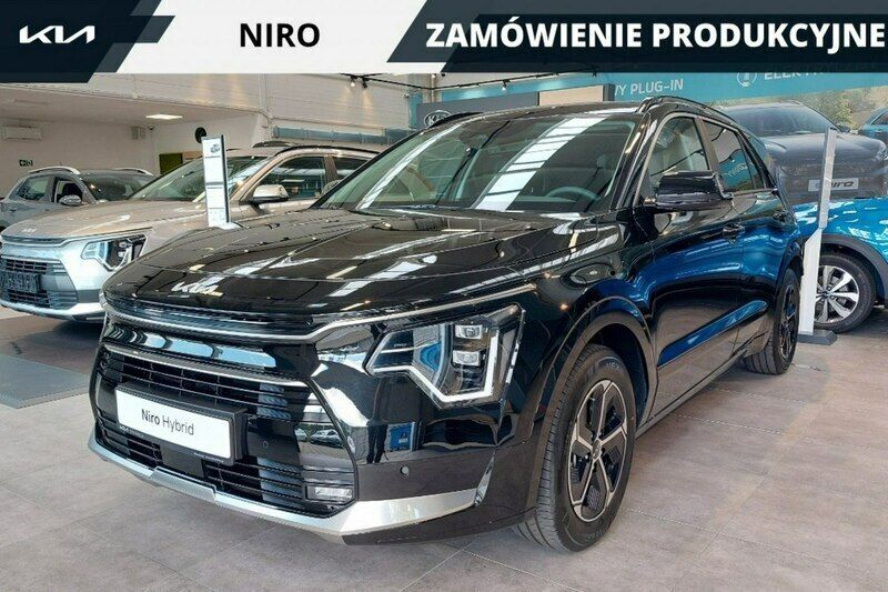 Czarny (metalik) Nowe 2024 Kia Niro 2 SUV | 137 700 zł (Uczciwa cena) - Obraz 1/4