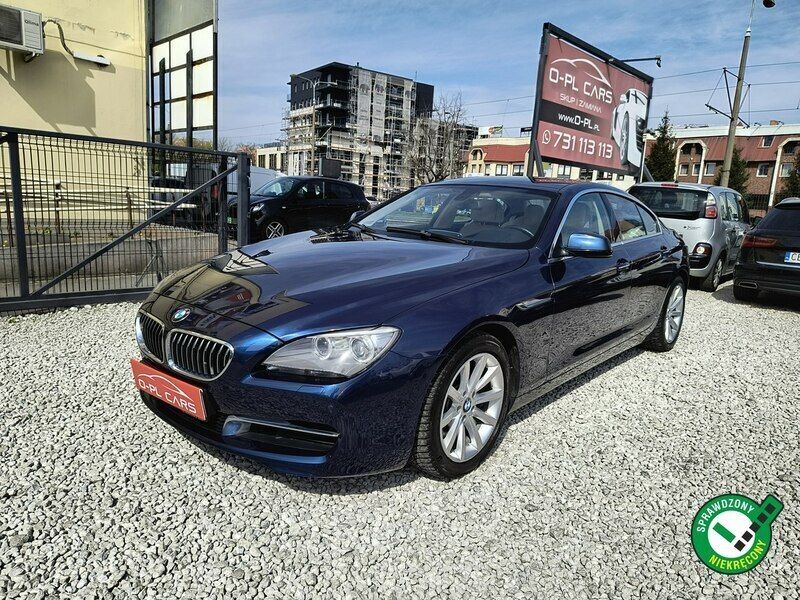 Niebieski ciemny (metalik, perła) Używany 2013 BMW 320 Coupe | 91 900 zł - Obraz 1/4