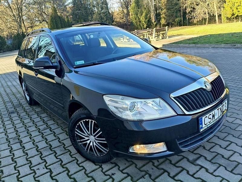 Używany Skoda Octavia 105 KM (77 kW) 2010 Czarny (metalik) Kombi