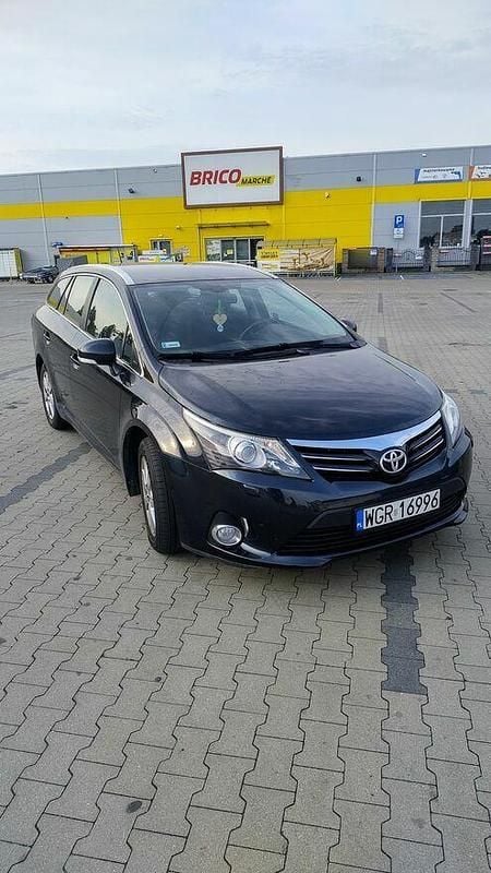 Czarny Używany 2015 Toyota Avensis Kombi | 31 500 zł (Uczciwa cena) - Obraz 1/4