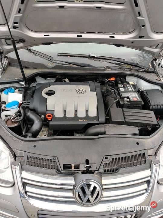 Srebrny Używany 2009 VW Golf V Kombi | 10 000 zł (Uczciwa cena) - Obraz 1/4