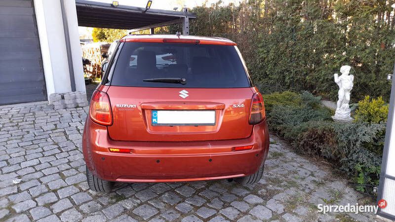 Czerwony Używany 2007 Suzuki SX4 Hatchback | 13 900 zł (Uczciwa cena) - Obraz 1/4