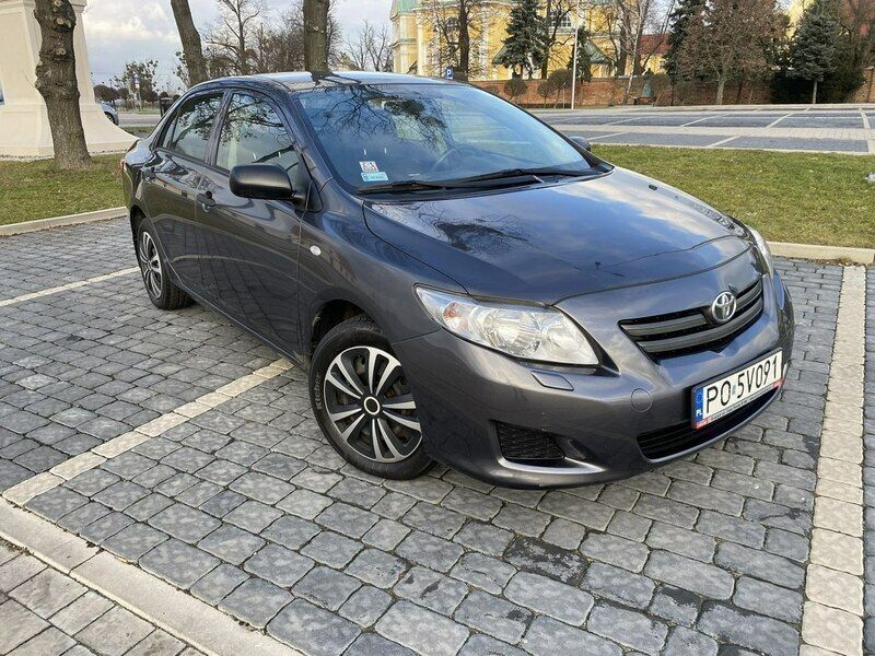 Używany Toyota Corolla 124 KM (91 kW) 2007 Szary Sedan/Limuzyna