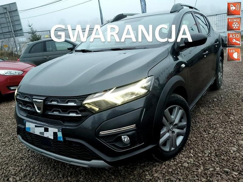 Szary (metalik) Używany 2022 Dacia Sandero Stepway Hatchback | 41 900 zł (Uczciwa cena) - Obraz 1/4