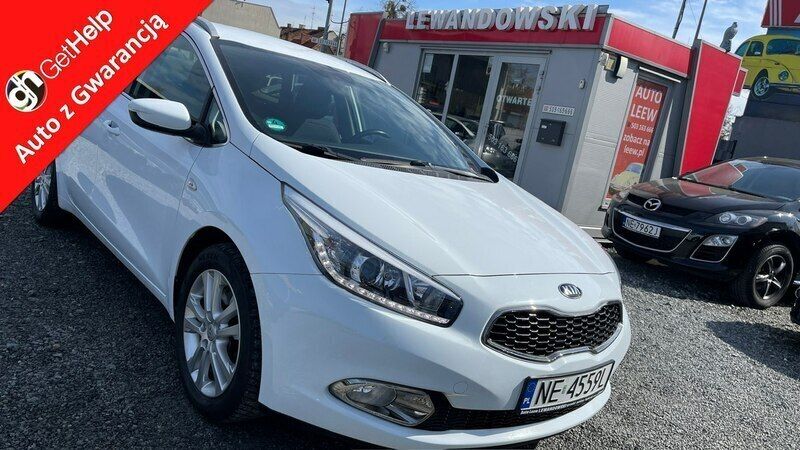 Biały Używany 2014 Kia Ceed 2 Kombi | 38 900 zł (Dość drogi) - Obraz 1/4
